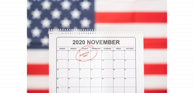 American flag with calendar highlighting November 3 as voting day 